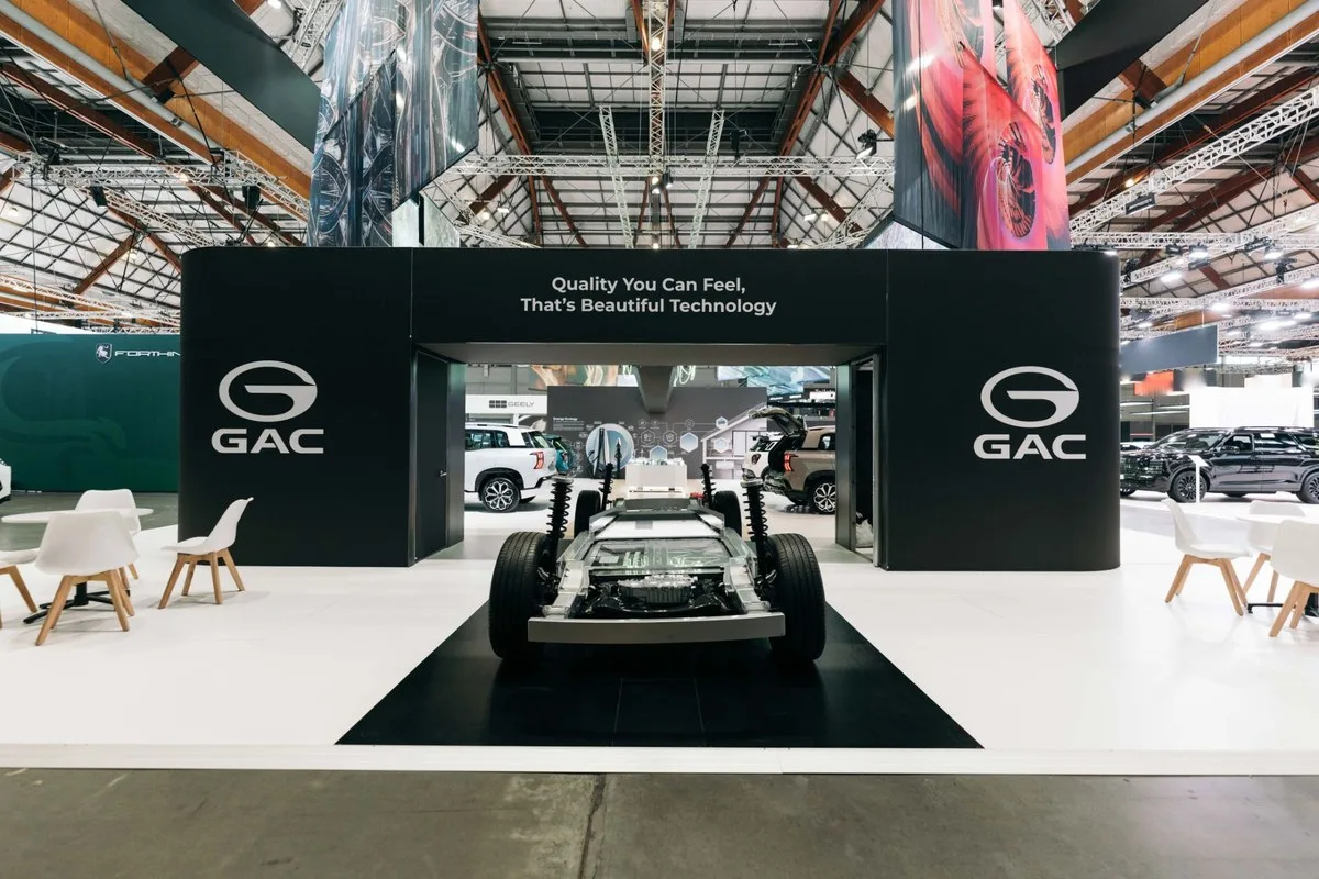 GAC stand entrance with a GAC skateboard chassis on display at Everything Electric Sydney
