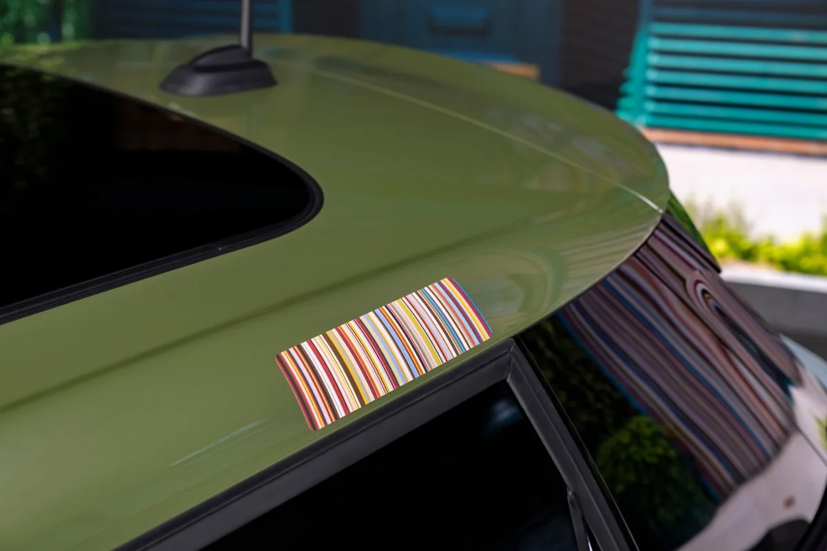Paul Smith multi-colour stripe panel on the green roof of a MINI