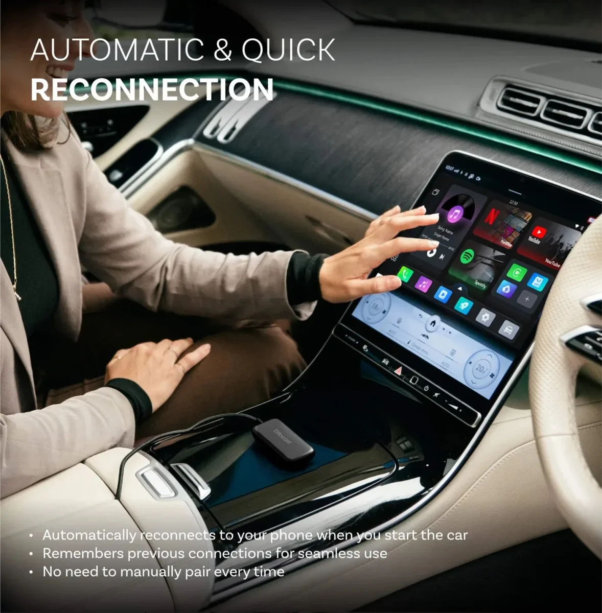 Ottocast Play2Video Ultra sitting in a Mercedes centre console with the screen running