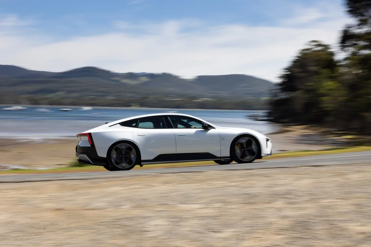 Polestar 5 Performance driving beside the water in Tasmania