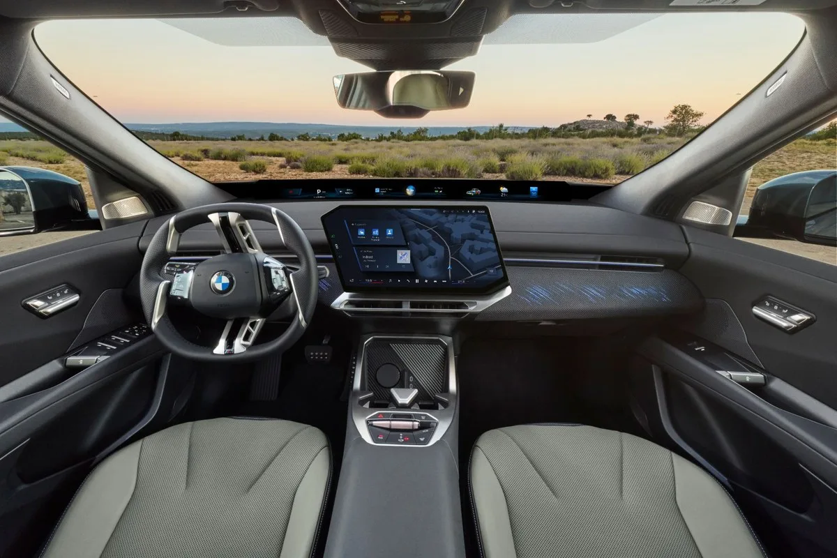 BMW iX4 dashboard with centre screen and panoramic display