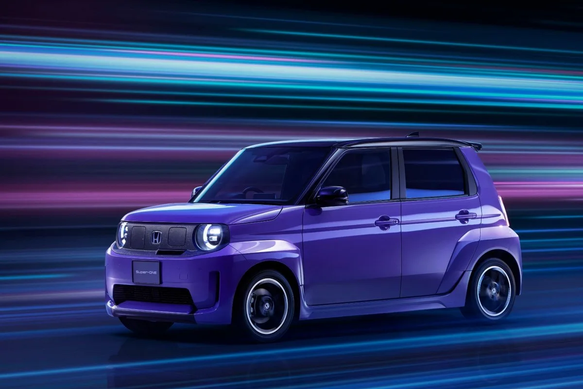 Honda Super-ONE electric hatch in Boost Violet Pearl, front three-quarter view