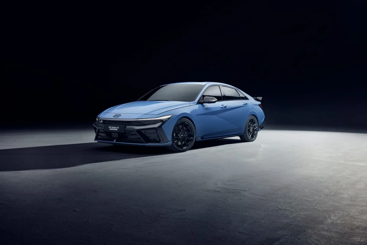 Blue Hyundai i30 Sedan N Monochrome front three-quarter view