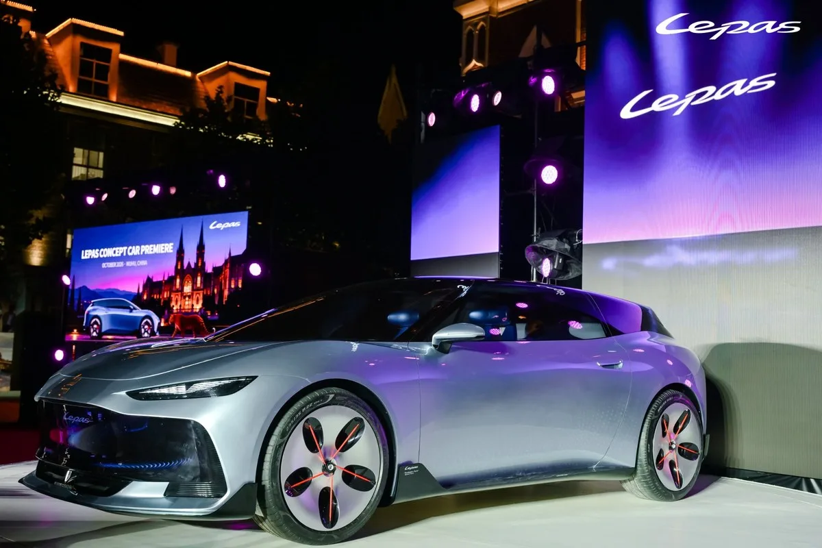 Silver Lepas AURA concept car on stage at its premiere in Wuhu, China