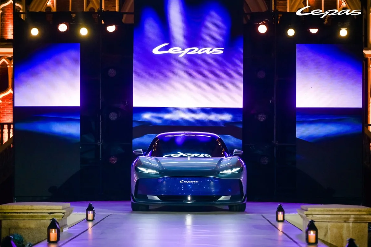 Front of the Lepas AURA concept with its black front panel and Leopard headlamps