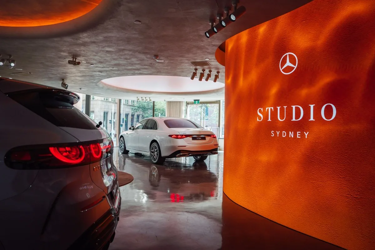 Mercedes-Benz S 450 4MATIC rear view beside the Studio Sydney sign